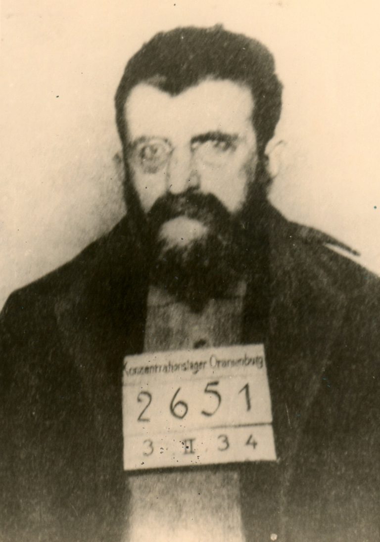 Prisoner photo, Erich Mühsam, Oranienburg concentration camp, February 3, 1934 People of Jewish background are particularly at risk if they share characteristics with other perceived enemies of the Nazi regime: The poet and anarchist Erich Mühsam is tortured and hanged by SS men in the Oranienburg concentration camp on July 9, 1934. Bundesarchiv, Berlin, BildY 10-769-8113